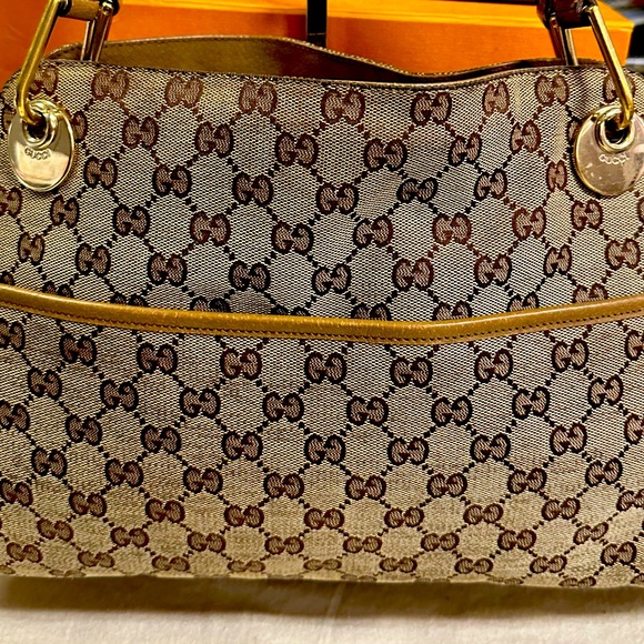 Gucci Handbags - Gucci monogram canvas shoulder handbag tan leather trim and gold hardware